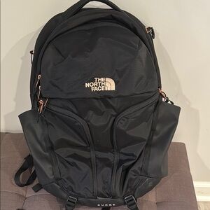 The North Face Black Backpack with Rose Gold Accents